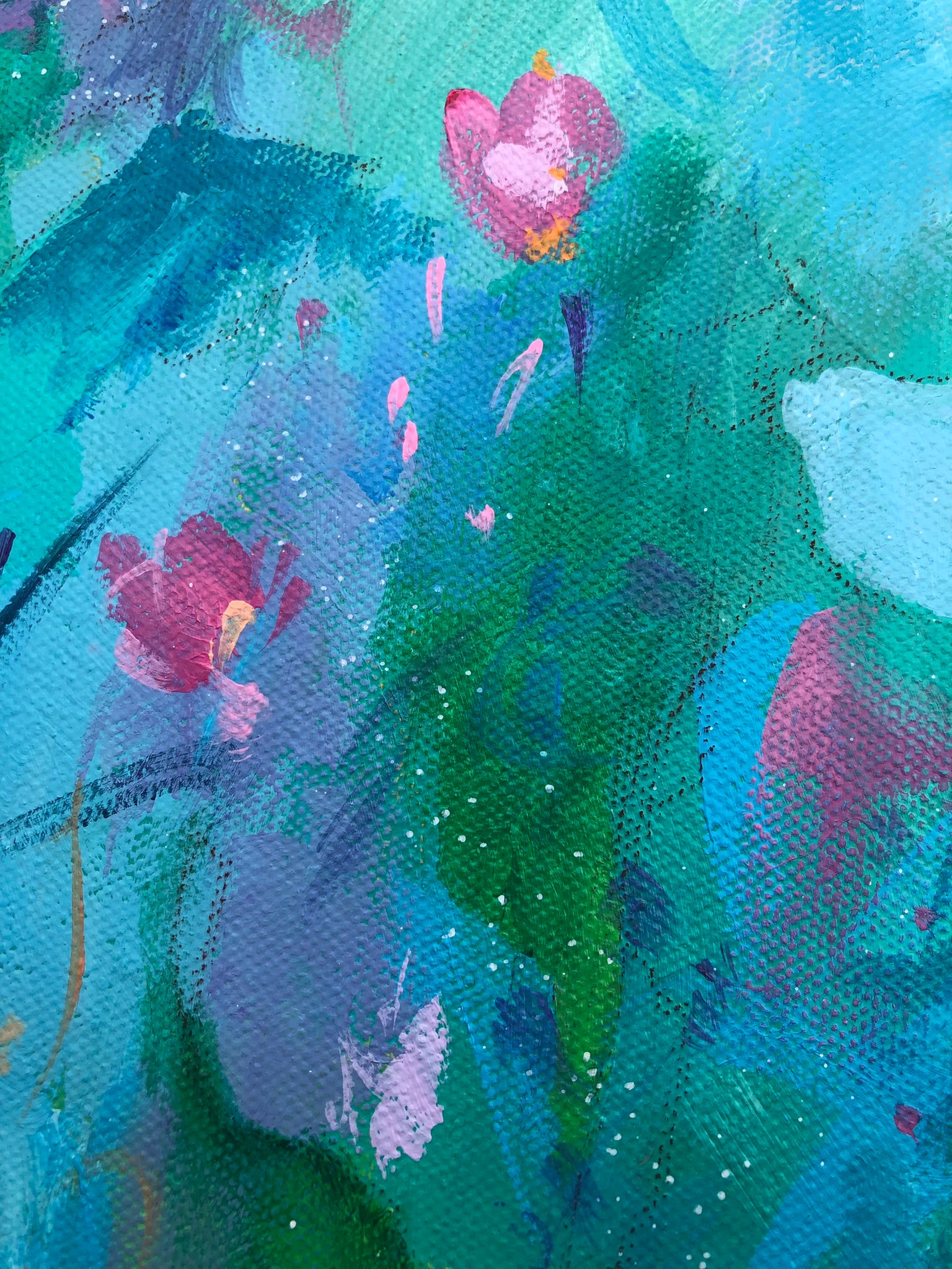 Close up details of the painting's background in shades of green, turquoise and blue and featuring small pink flowers scattered about