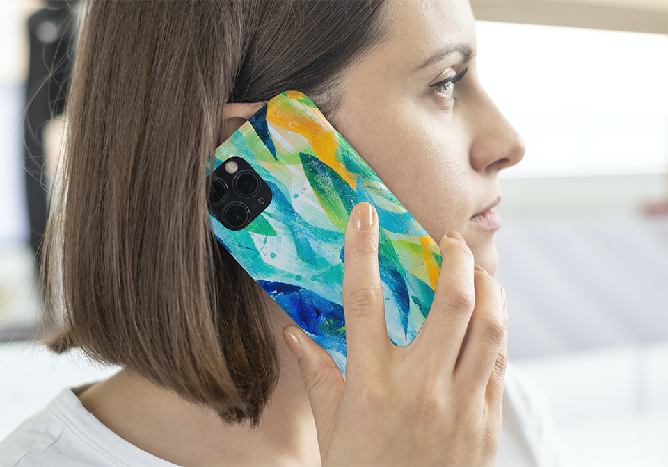 Woman holding Synergy colourful original art phone case for iphone 14