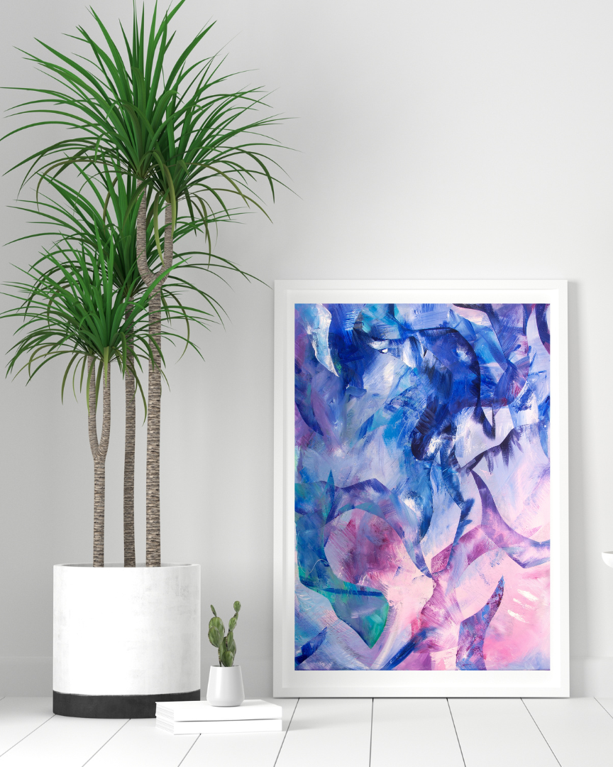 Exploration blue, pink and purple abstract art print displayed in a white frame in a contemporary white interior.