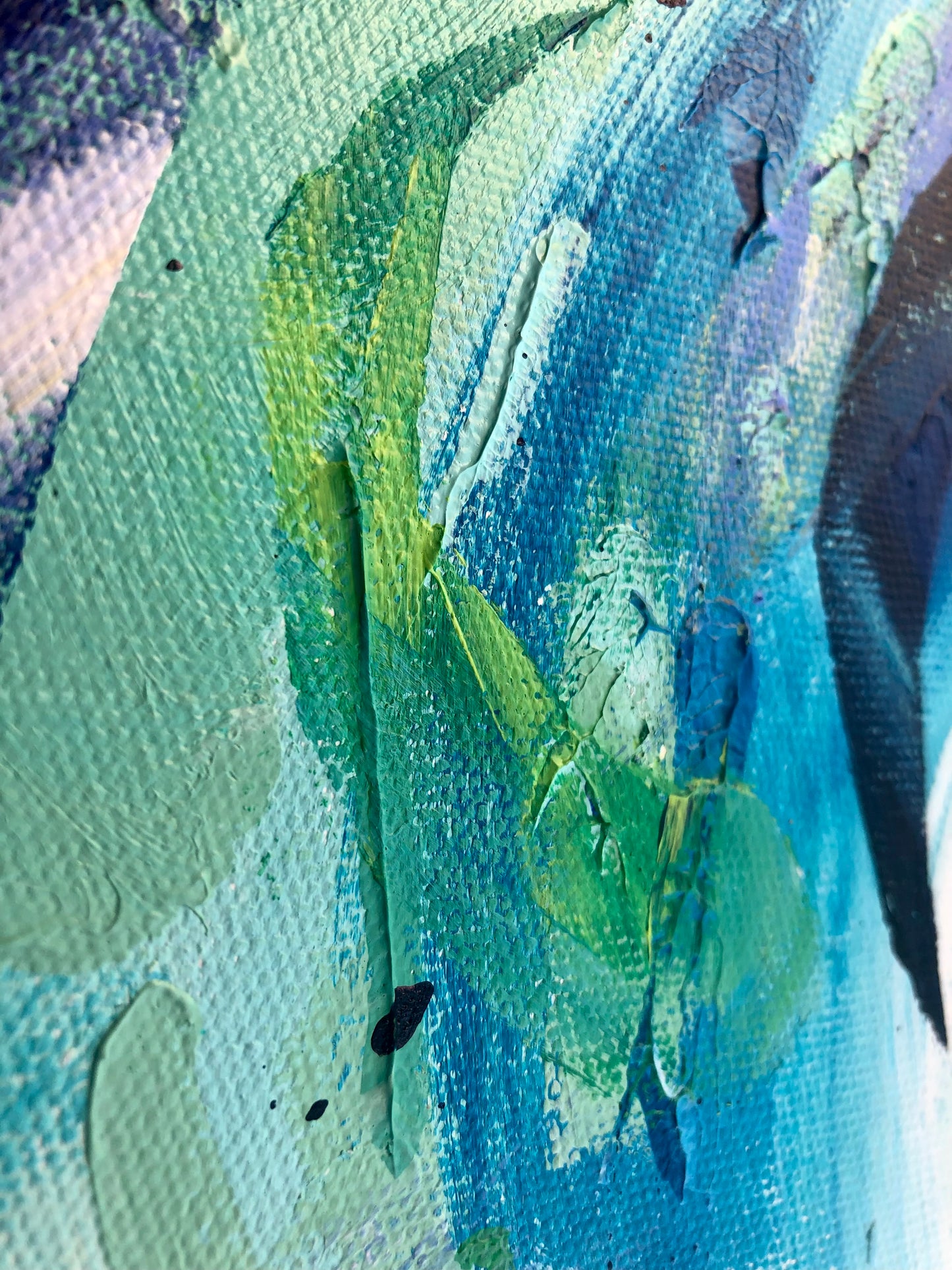 Close-up of painting details from an original acrylic painting in shades of blue and green