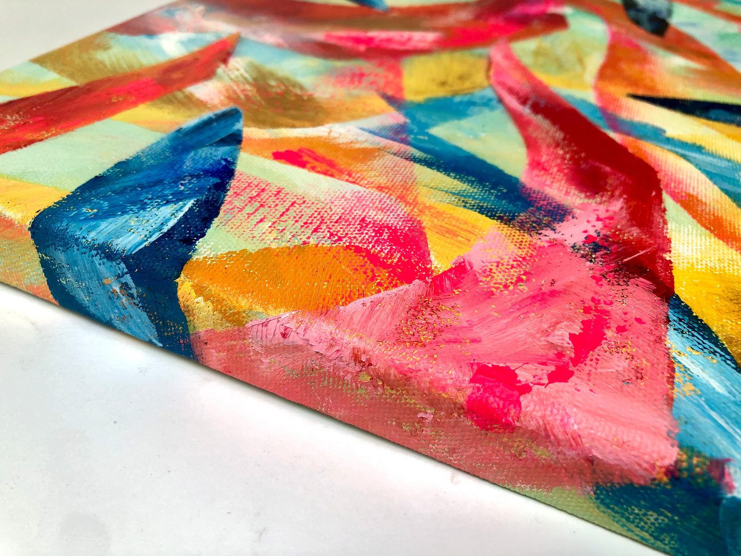 Close-up detail of side of abstract painted canvas