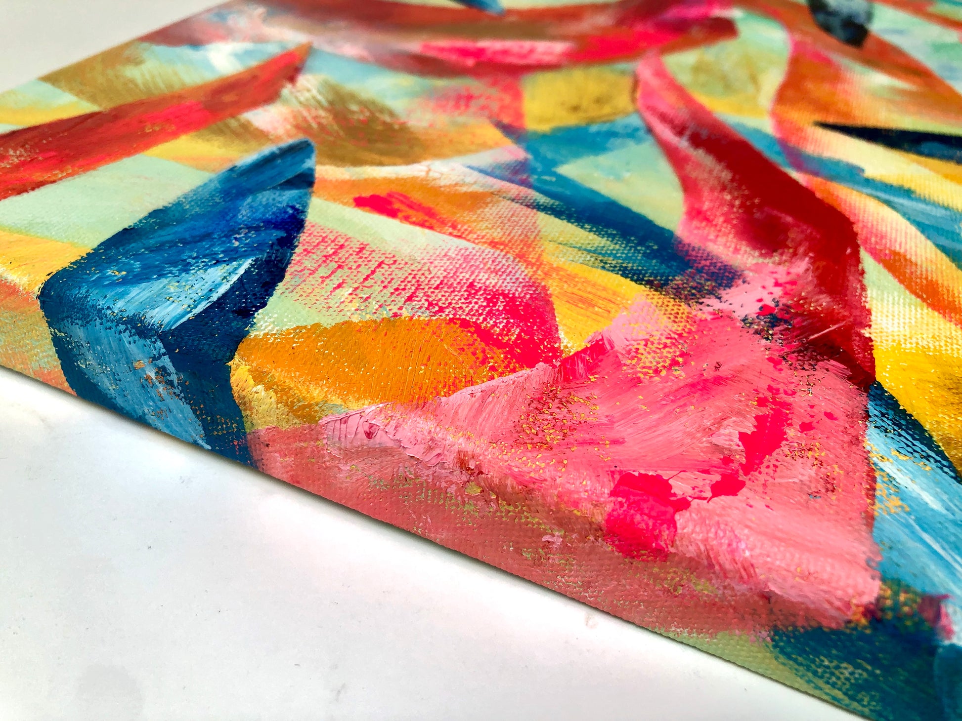 Close-up detail of side of abstract painted canvas
