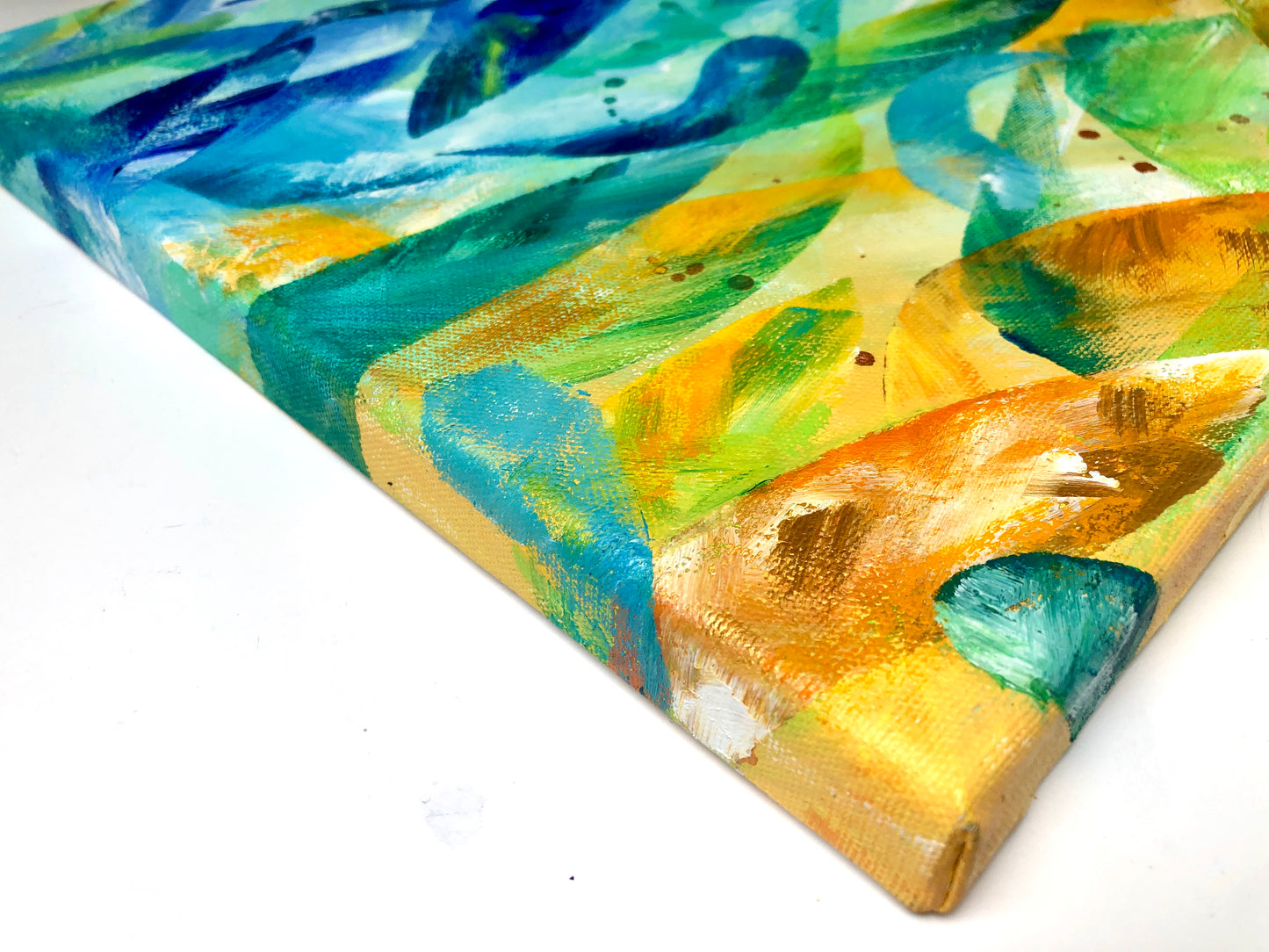 Close-up detail of side of abstract painted canvas