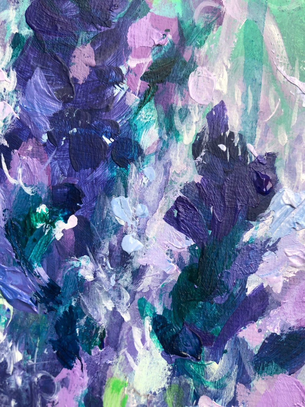 Close up details of purple, lilac and green floral painting