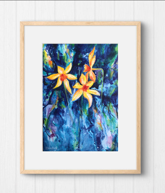 Framed artwork of yellow flowers on a blue background