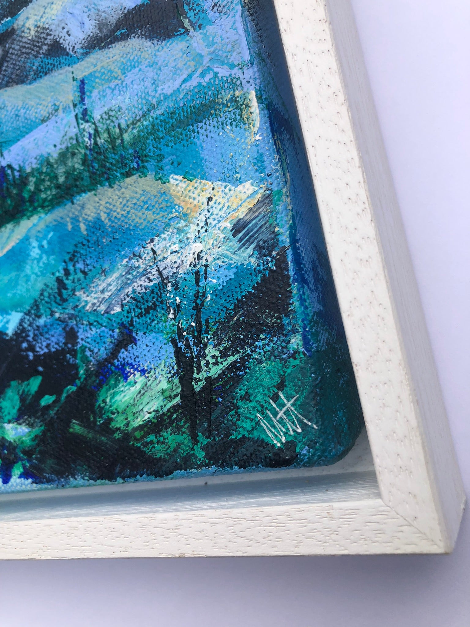 Close-up detail of Into the Blue painting in white tray frame