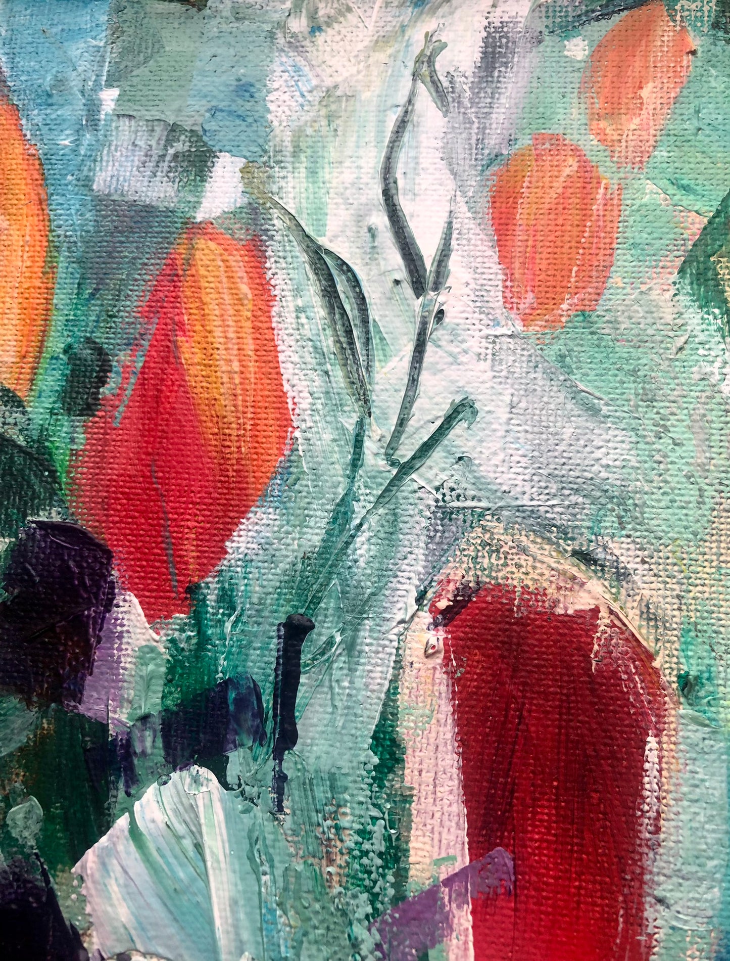 Abstract painting with red, orange, and green colors