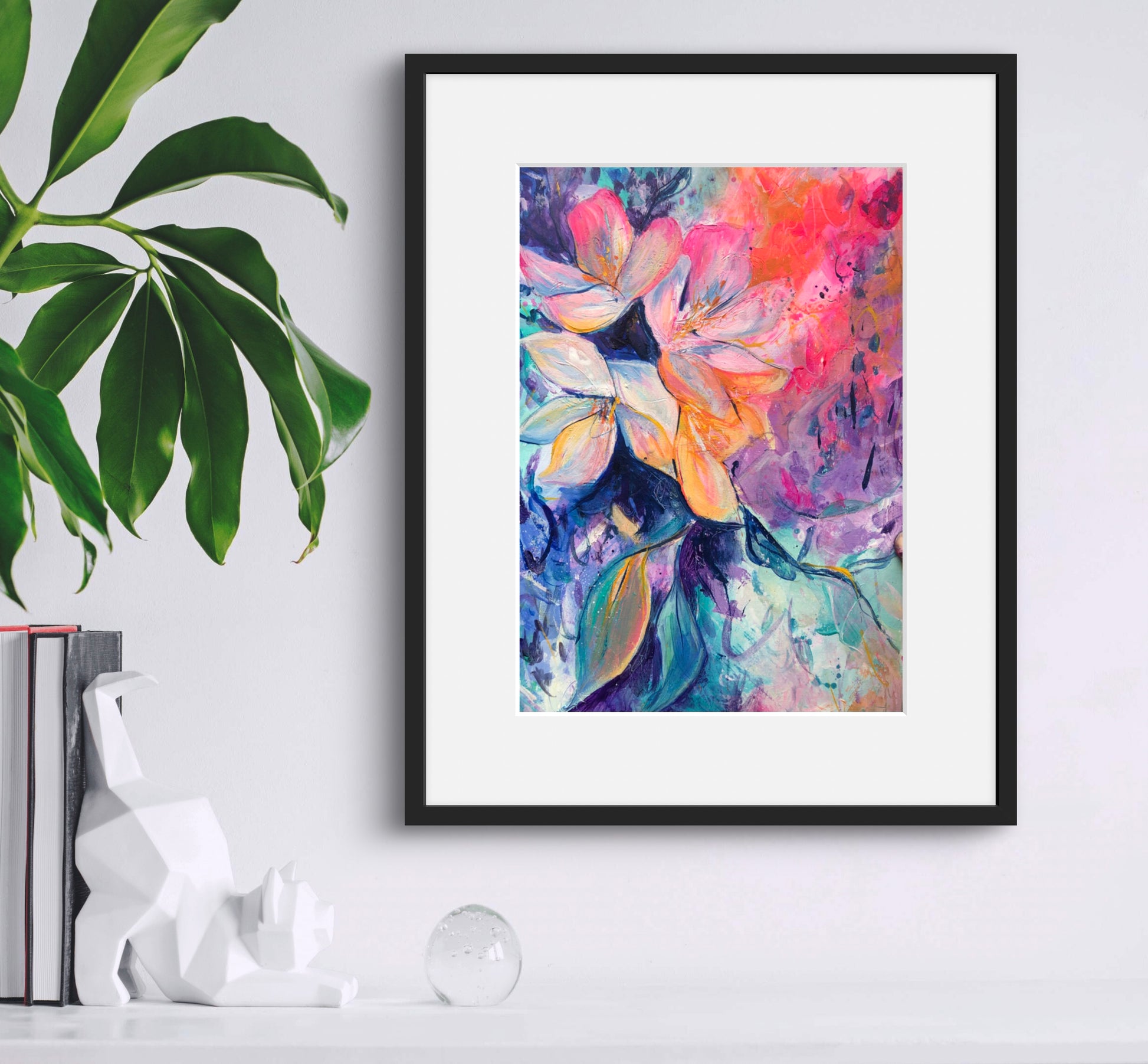 Sunshine floral painting displayed in a classic black frame with white mount on a white wall.