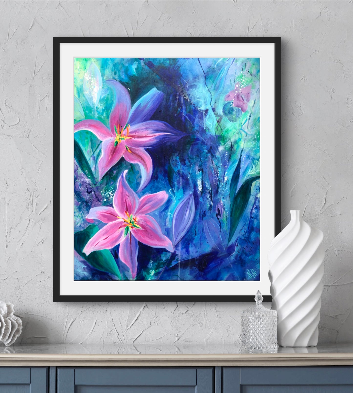 Framed art print of pink lily flowers in a simple black frame