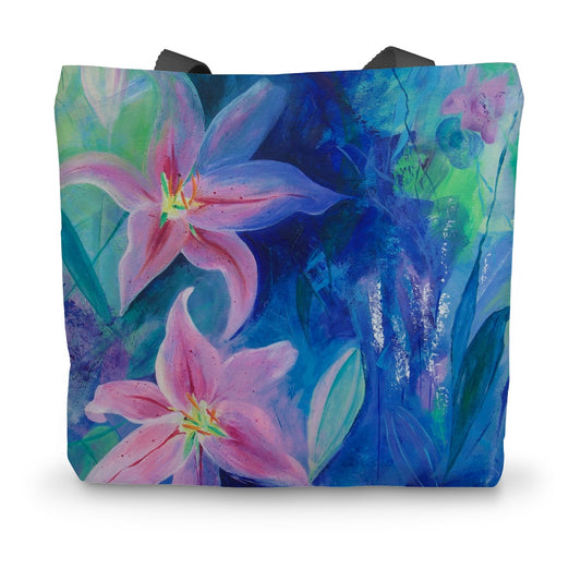 Blue and pink canvas tote bag featuring a floral art print of Lilies in Bloom by artist Melanie Howells