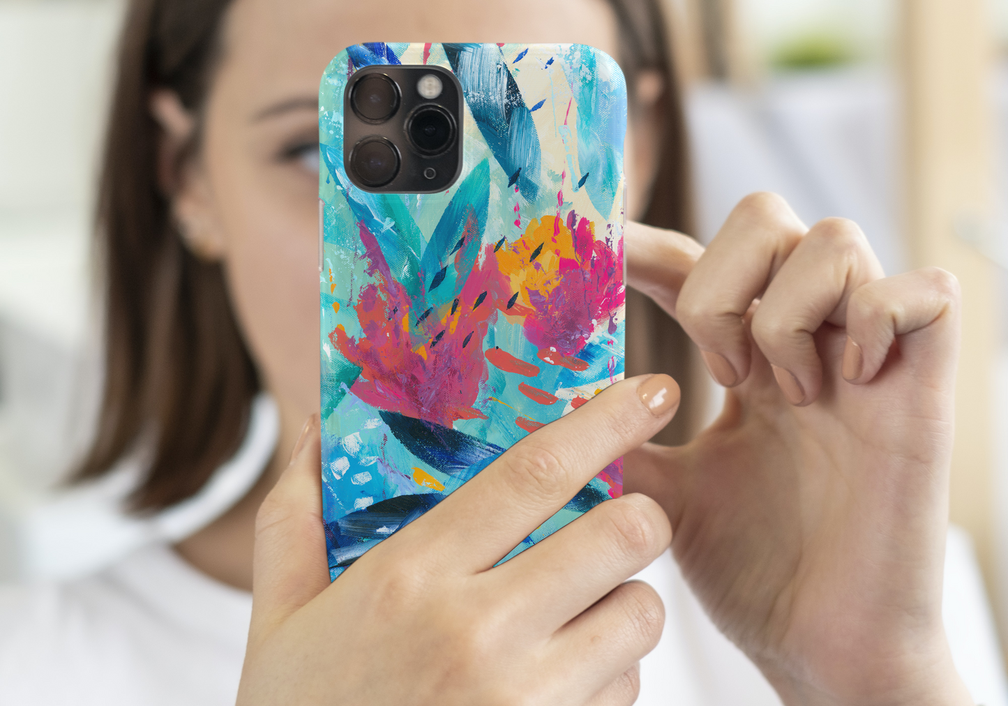 Woman holding Tropical Seas colourful abstract art mobile phone protective case for iphones and samsung galaxy