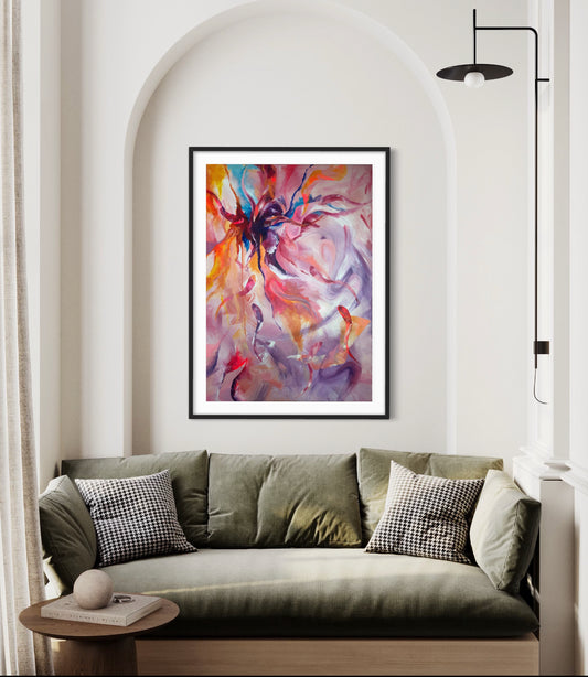 Sargasso colourful abstract art print in a black frame on a white wall in a contemporary room with a sofa