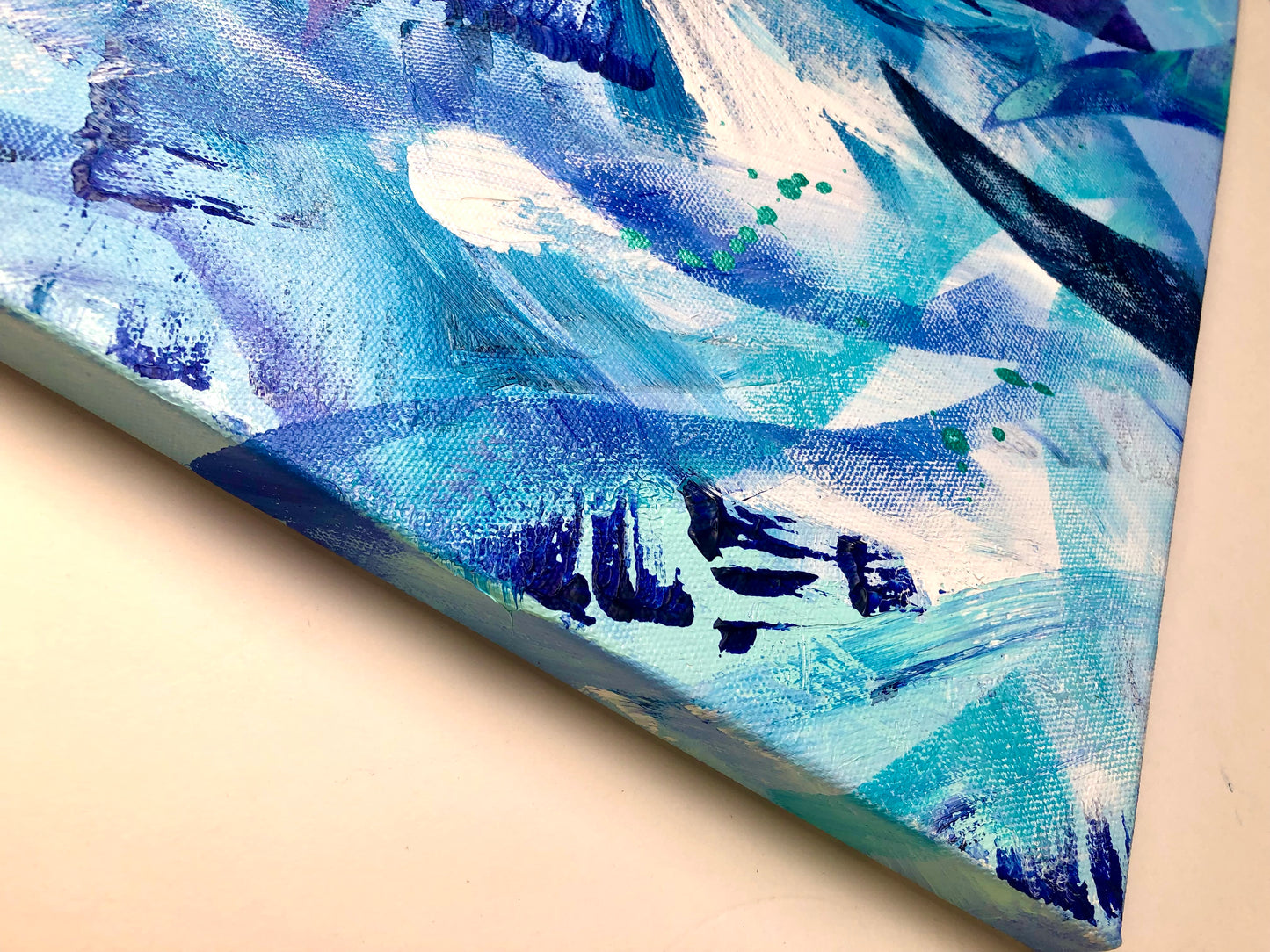 Close-up of painting and frame from an original acrylic painting in shades of blue and white