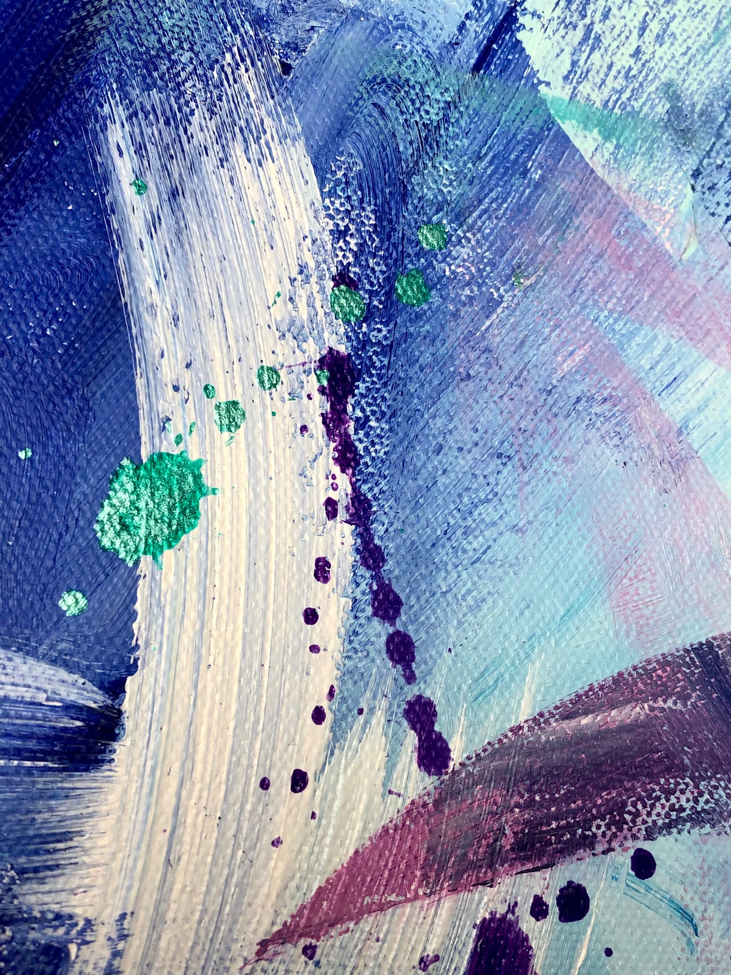 Close-up of painting details and drips from an original acrylic painting in shades of blue, purple and white