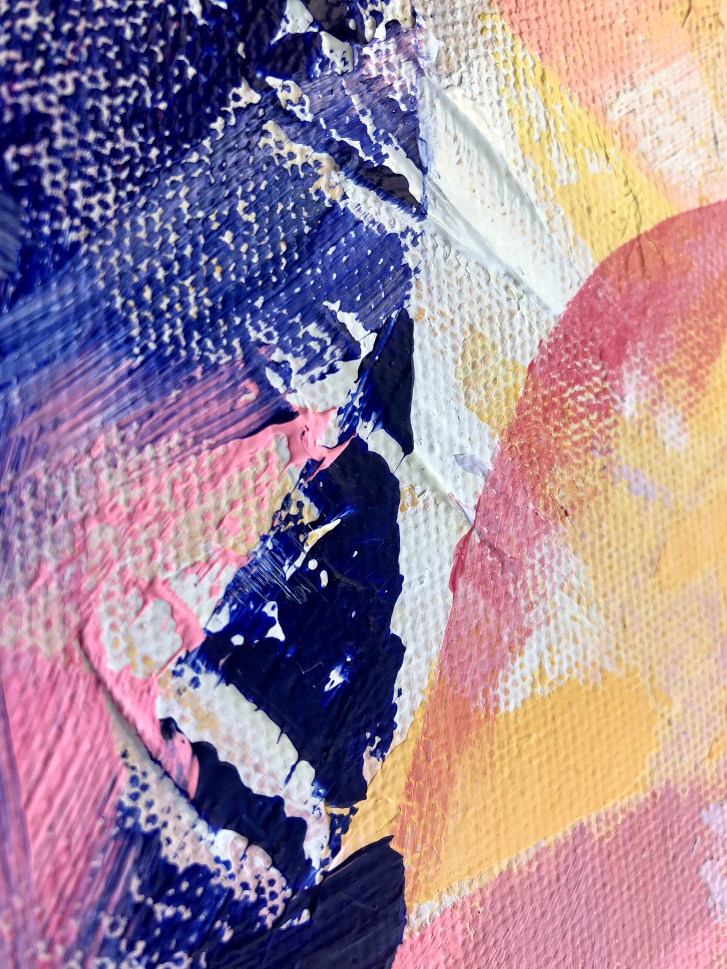 Close-up of painting details from an original acrylic painting in shades of pink, purple, yellow and white