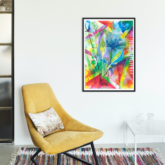 Flourish colourful abstract art print displayed in a black frame on a white wall in a contemporary interior decor featuring a yellow chair.